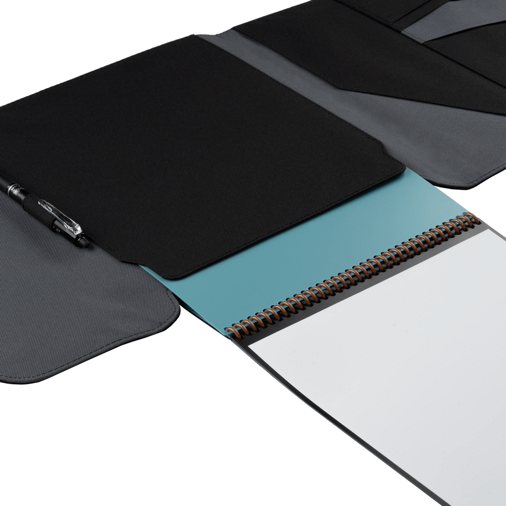 A closer view of the Rocketbook Flip sliding into a black Flip Capsule folio case